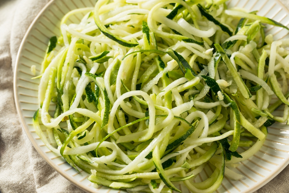 Raw green organic zucchini noodles